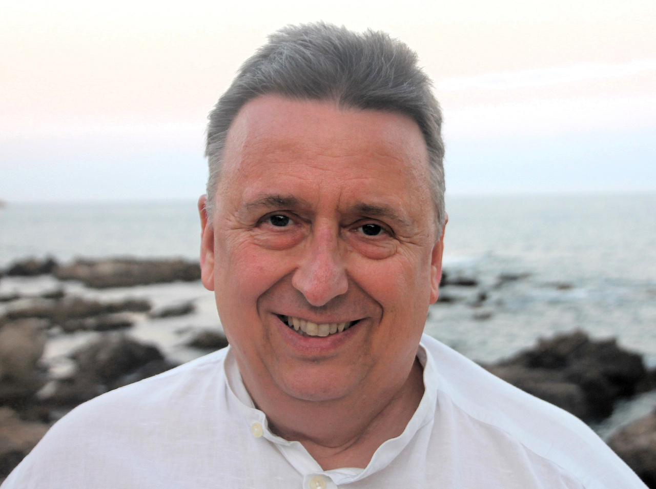 Ein Portraitfoto von Karl Wilhelm Kruse, der freundlich lächelt.