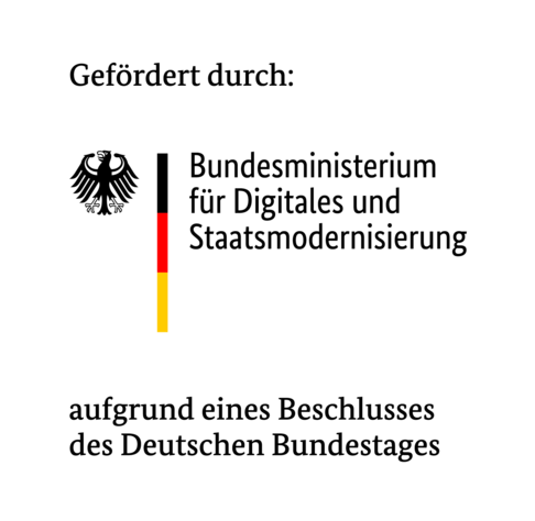 Logo des Bundesministerium Farbild schwarz, rot, goldener Balken und Adler