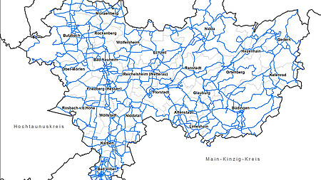 Eine Umrisskarte zeigt den Wetteraukreis und mit blauen Linien markiert das Radwegenetz im Kreisgebiet.