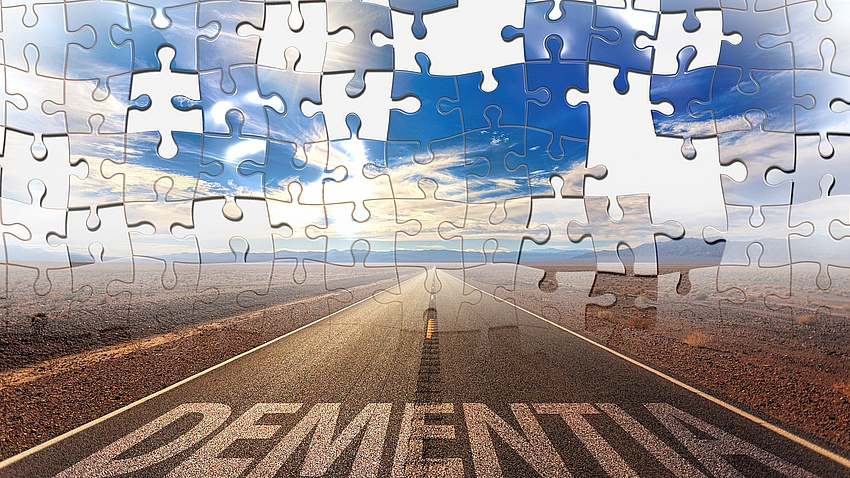 Im oberen Teil fehlende Teile in einem Puzzle, im unteren Teil eine Straße mit der Aufschrift Dementia, Bildquelle: Pixabay geralt